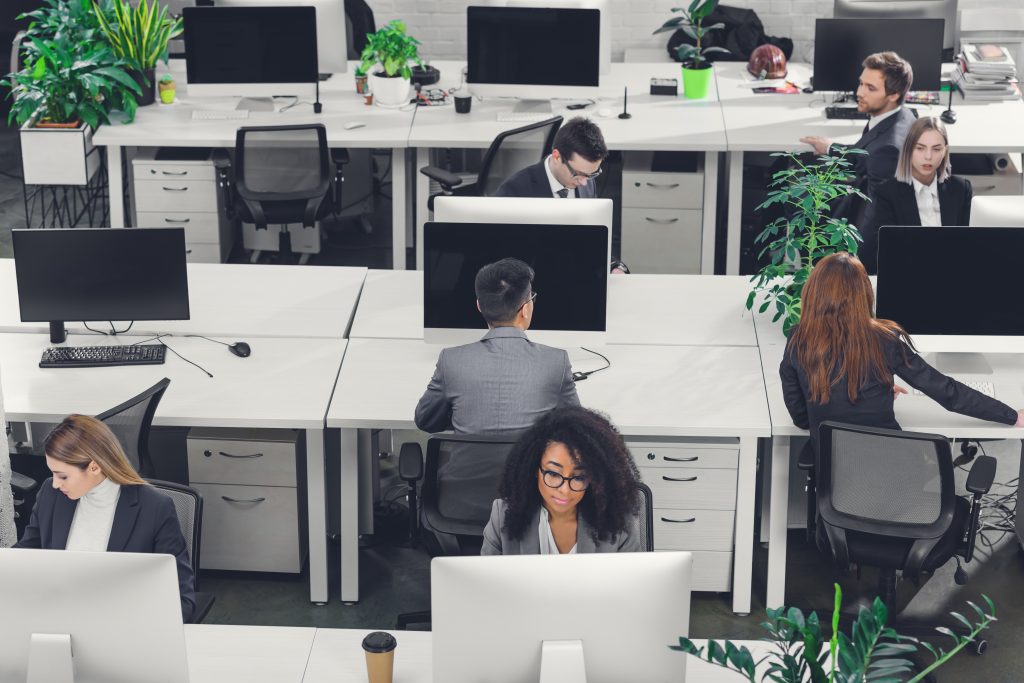 professional office with rows of desks